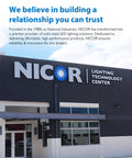 Exterior of NICOR Lighting Technology Center building with company signage, showcasing a blue sky background.