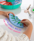 Child holding mold from Ultimate Gummy Candy Making Kit For Home Use With Four Mold Shapes And Heating Base, Gummy Bear Lab Machine Maker