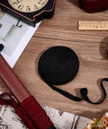 7M Black Ito Sageo Wrapping Cord 0.5 Inch Wide Silk Cotton Blend Rope for Katana Handle next to wrapped sword handle