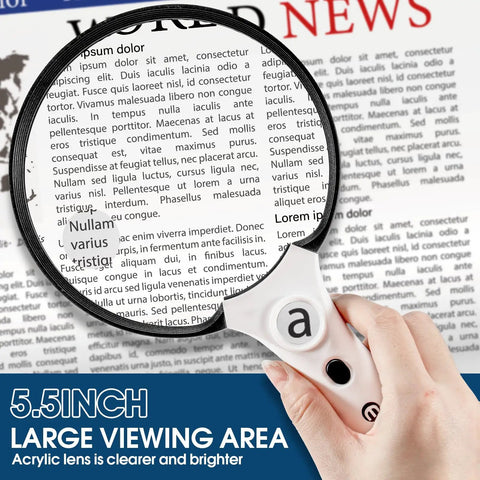 3X Lighted Magnifying Glass With LED And UV Light, 5.5 Inch Handheld Magnifier for reading, held over newspaper text