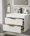 No Fuss 24 Inch Wall Mount Bathroom Vanity With Durable Resin Sink And Deep Twin Drawers, Smooth White MDF Floating Cabinet Featuring Matte Black Handles for modern bathroom decor.