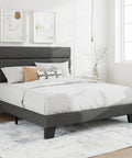 Full Platform Bed Frame With Upholstered Fabric Headboard In Grey Featuring Dense Foam Padding And Breathable Polyester For Super Comfy Nights and Straight Up Quality Bedding Setup, shown in a well-lit bedroom.