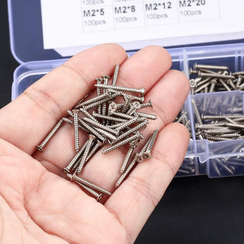 M2 Flat Head Self Tapping Screws Assortment Kit Featuring Nickel Plated Carbon Steel build in a hand, showcasing various sizes for easy fastening.