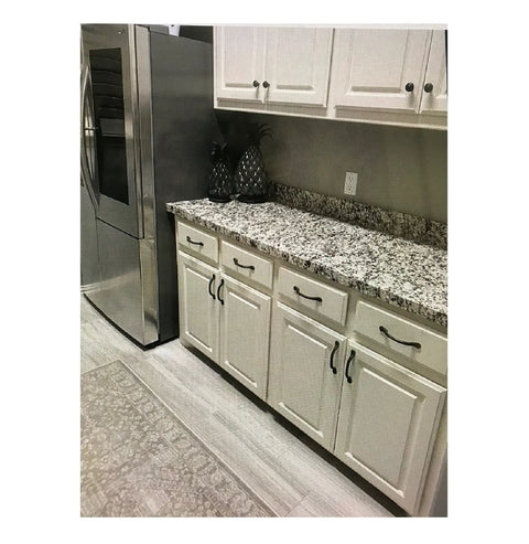Peel And Stick Waterproof Vinyl Countertop Backsplash Wrap 36x144 in grey off white black granite marble look in kitchen setting.