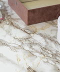Brown Marble Self Adhesive Film For Walls And Furniture Peel And Stick Decorative Vinyl Wrap Cortes Brown Marble Look 17 By 78 Inches Ideal For Cabinets Shelves DIY Friendly Home Decor showcasing its marble pattern.