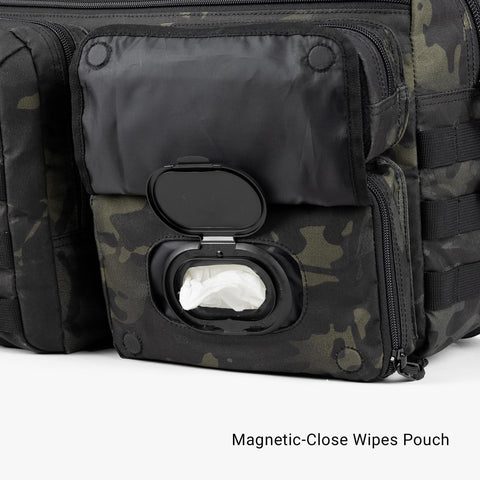 Magnetic-close wipes pouch on Deuce 4th Gen Tactical Diaper Bag For Dads With Included Changing Mat And Stroller Straps Water Resistant 600D Polyester Daddy Mommy Name Tape Patches Ultra Organized Go To Baby Gear.
