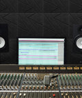 52 Pack Heavy Duty Soundproof Foam Panels For Walls High Density Acoustic Tiles in a studio with sound mixer and monitors.