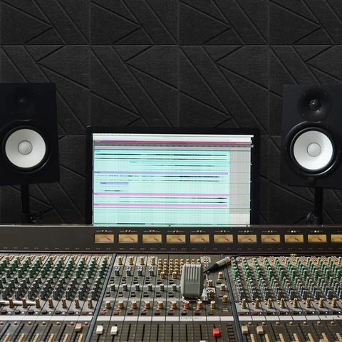 52 Pack Heavy Duty Soundproof Foam Panels For Walls High Density Acoustic Tiles in a studio with sound mixer and monitors.
