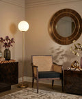 Luna LED Floor Lamp Dope Modern Tall Light For Living Rooms And Home Offices With Frosted Glass Globe Mid Century Style Standing Lamp In Brass Gold Finish Perfect For Reading In The Bedroom And Cozy Vibes in cozy living room setting