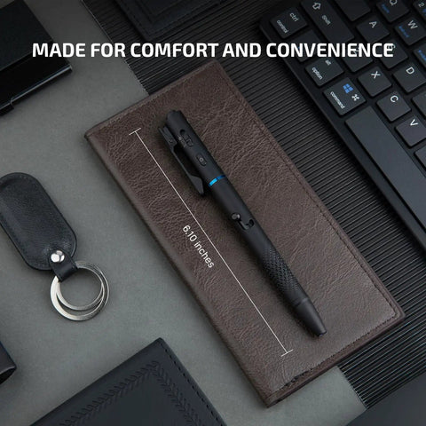 O'Pen 3 EDC Pen Light Go-To 4 in 1 Bolt Action USB C Rechargeable Flashlight resting on leather notebook