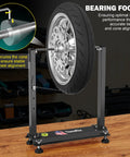 Heavy Duty Motorcycle Wheel Balance Stand For Static And Dynamic Tire Alignment Fits 12 Inch And Larger Wheels High Precision Bearings All Steel Construction Built To Last Tough As Nails, illustration of wheel alignment with detailed bearing focus.