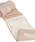 Close-up of bandage from Compact First Aid Kit For Bleed Control On The Go With Vacuum Sealed Pack Includes Compressed Gauze Petrolatum Gauze ETD Gloves And Surgical Tape For Non Medic Caregivers And Emergency Responders.