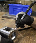 Using Air Pencil Grinder Pro Grade Tool With One Eighth Inch Collet And Burr on metal part at 60,000 RPM for precise deburring