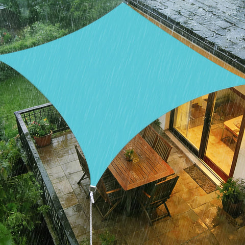 Lake Blue 9 Foot 9 Inch By 9 Foot 9 Inch UV Blocking Waterproof Shade Sail Rectangle Awning over a rainy patio.