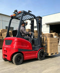 Badass Low Noise Electric Forklift Heavy Duty Pallet Lifter Truck For Warehouse Logistics moving a pallet of boxes outdoors.