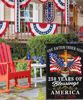 Patriotic 250th Anniversary USA Flag for Outside Garden Decor, displayed with red chair and porch, features 'One Nation Under God' and eagle design.