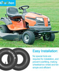 Beefy Heavy Duty Inner Tube For 15x6.00-6 Tires With TR13 Straight Valve Stem next to an orange lawn mower on grass