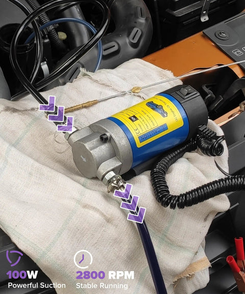 No Fuss 12V Self Priming Oil Extractor Pump Heavy Duty Transmission Fluid Suction Tool For Cars Motorcycles Lawn Mowers on a workbench.