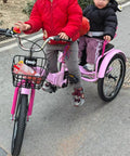 Foldable Three Wheel Tricycle Cruiser With Back Seat, Front Disc Brake and Dual Brakes on a sidewalk