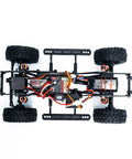Badass 1/18 Scale RC Crawler With Slick Shifting Two Speed Transmission And Bulletproof Metal Gears Nasty Terrain Rock Climbing Rig Trail Smashin Setup Drop In Ready Convoy Medium Olive Green top view of chassis with electronics and tires