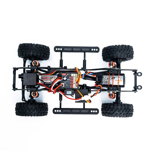 Badass 1/18 Scale RC Crawler With Slick Shifting Two Speed Transmission And Bulletproof Metal Gears Nasty Terrain Rock Climbing Rig Trail Smashin Setup Drop In Ready Convoy Medium Olive Green top view of chassis with electronics and tires