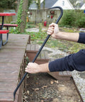 Using a 36 Inch Pry Bar With Drop Forged Steel Build, Rust Resistant Crowbar For Demolition to lift wooden deck planks
