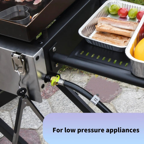 8 Feet High Pressure Propane Regulator With 20 Psi Adjustability And Hose QCC1 Connection attached to outdoor cooker