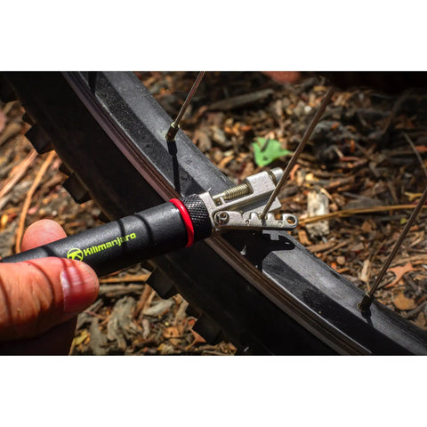 Using Compact Bar End Bicycle Tool Kit With Chain Tool Spoke Wrench for bike repair