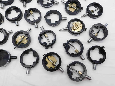 Assorted Dial Test Indicator Spare Parts Bundle Plug And Play For Precision Machine Repair Featuring black metal dials and gears.