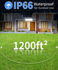 Crazy Bright 100W LED Shop Light Delivers 11000 Lumens Of Daylight 6000K shown illuminating a house exterior, IP66 waterproof, 1200 square feet area