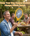 Man using Ultra Fast Electric Fly Swatter Bug Zapper For Indoor Outdoor Use 2200V Mosquito Killer Handheld Zap Tool at outdoor gathering