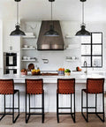 Three Pack Industrial Pendant Lights Black Metal Finish above kitchen island in modern rustic style dining room.