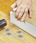 Heavy Duty Stainless Steel Furniture Fastener Kit With Invisible Three In One Connectors And Knockout Joint Screws For Straight Shots On Tight Cabinet Fixes Today, installation process with connectors and hammer.