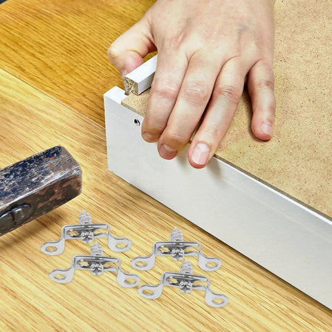 Heavy Duty Stainless Steel Furniture Fastener Kit With Invisible Three In One Connectors And Knockout Joint Screws For Straight Shots On Tight Cabinet Fixes Today, installation process with connectors and hammer.