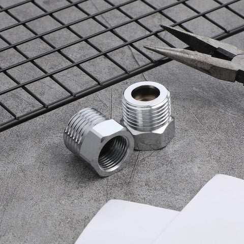 Two chrome-plated pipe fittings with 1/2 in male threads and 3/8 in compression female ends for faucet supply lines.