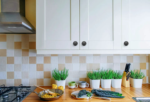 Kitchen with white cabinets featuring Matte Black Kitchen Cabinet Knobs 20 Pack Round Drawer Pulls For Cupboards And Dressers Euro Style Hardware For Modern Home Makeover Durable Finish Easy Install Smooth Operation Sleek Contemporary Look.