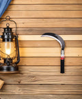 Two Piece Manganese Steel Garden Tool Set With Ergonomic Short Handles on wooden wall, featuring sickle for easy weeding and cutting.