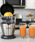 Compact Automatic Citrus Juicer With Hands Free Electric Press For Fresh Orange Lemon Lime Extract in a kitchen setting.