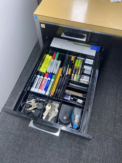 Open desk drawer featuring a 10 Compartment Tool Box Organizer Tray, Heavy Duty Plastic Parts Storage For DIY Projects, filled with office supplies.