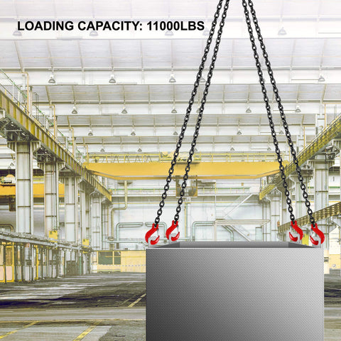 Front view of four-leg chain sling with red grab hooks lifting a steel block in an industrial warehouse
