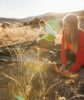 Campers setting up the Grand Mesa 2 Footprint for Tent Lightweight Water Resistant Ground Cloth Built for Grand Mesa 2 Person Tent