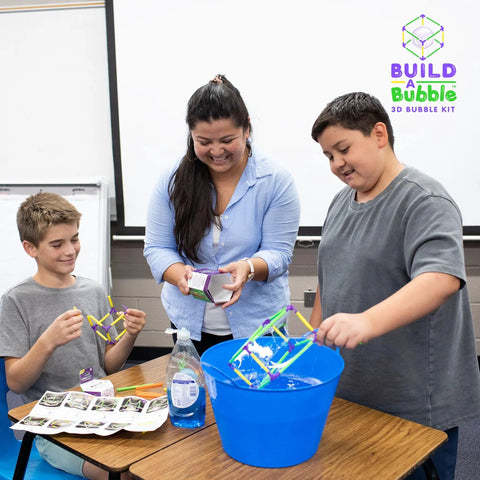 Children using 3D Bubble Maker Kit For Kids 8 And Up A Totally Dope Hands On Screen Free STEM Building Toy With 57 Pieces indoors.