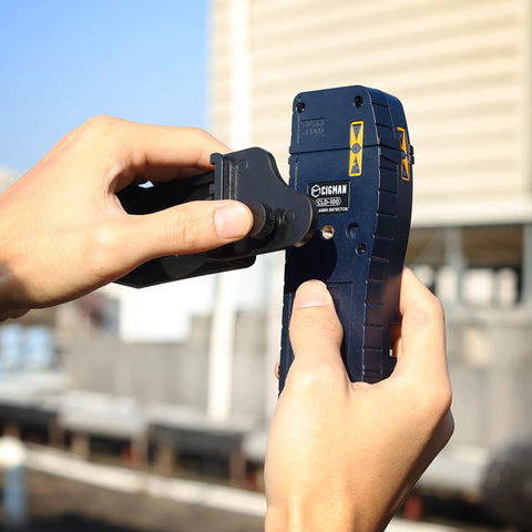 Hands adjusting Line Laser Level Detector With Pulse Receiver For Accurate Alignment, Green And Red Pulse Readouts, Up To 165 Feet Range