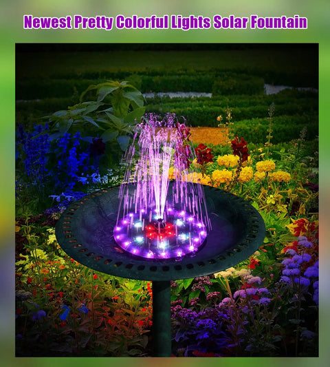 Upgraded Solar Fountain For Garden Pond And Bird Bath With 60 LED RGB Lights 7 Nozzles And 4 Fixers Built In 4000mAh Battery Ideal Outdoor Water Feature For Yard Pool at night with colorful lights illuminating water in a garden setting