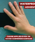 Hand applying Waterproof Patch Seal Tape For Quick Leak Fixes, 6 Inch By 5 Foot Black, Flexible Silicone-Butyl Adhesive on wet surface.