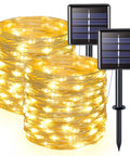 2 Pack Outdoor Solar String Lights With 33 Feet Copper Wire, 100 LED Warm White Fairy Lights displayed with solar panels
