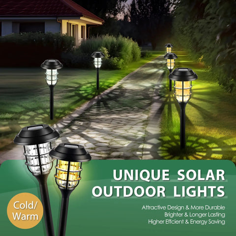 Outdoor Solar Lights For Yard And Pathway Waterproof Landscape Lighting For Garden Patio Walkway Driveway 8 Pack Warm White With Snowflake Pattern No Fuss Install Energy Saving Solar Path Lights illuminating a garden pathway.