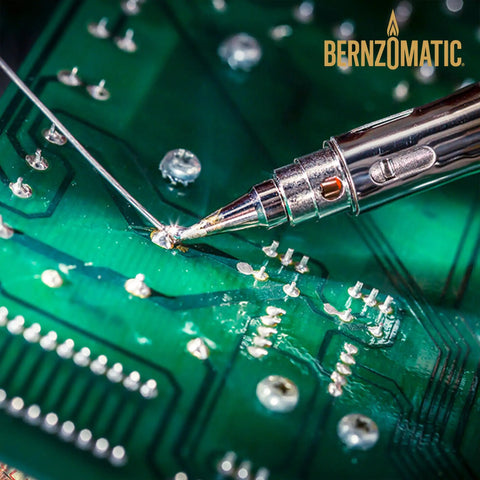 Compact Butane Torch Kit With Adjustable Precision Flame Built In Igniter Spark Ready Solder Tip in use on circuit board