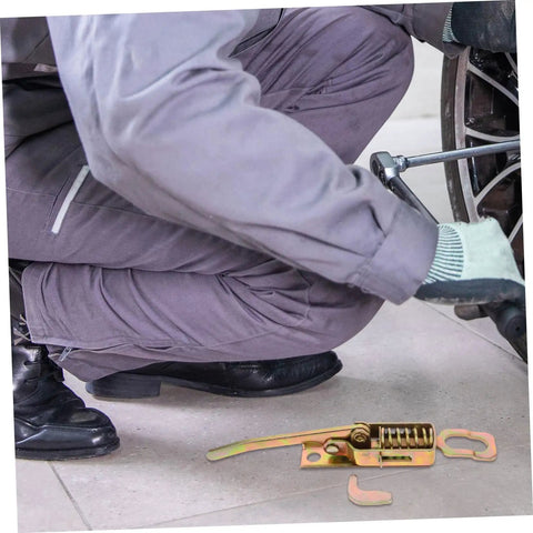 Heavy Duty Truck Latch Kit With Spring Release on floor near mechanic working on vehicle wheel