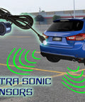 Four Sensor Car Reverse Parking Radar System With LED Display Ultrasonic Back Up Sensors Kit attached to blue car